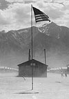 Dust storm at this War Relocation Authority center where evacuees of Japanese ancestry are spending the duration, July 3, 1942. Photo: Department of the Interior. War Relocation Authority. Source: National Archives. 