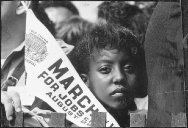 Civil Rights March On Washington, D.C. (A Young Woman at the March With A Banner)