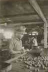 Filipino Man Processing Fruit