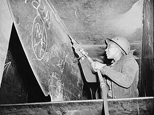 Miss Eastine Cowner, A Former Waitress, Is Helping In Her Job As A Scaler To Construct The Liberty Ship Ss George Washington CarverKaiser Shipyards, Richmond, California